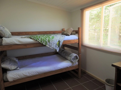 Bunk beds in bedroom 2 at The Bush Buck Cottage